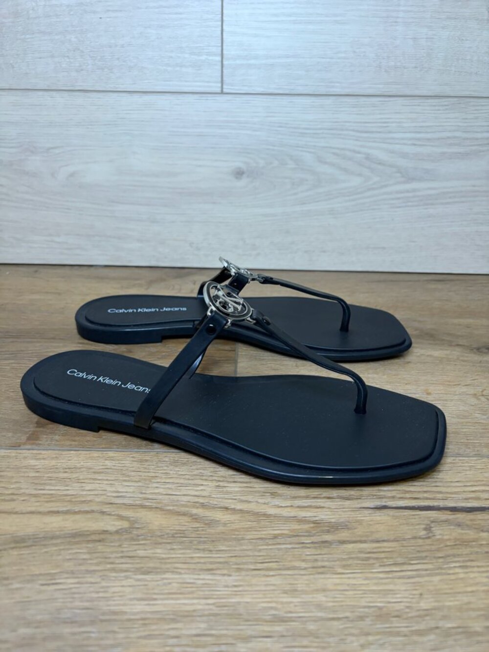 Calvin Klein Ellye Black Flat T Strap Thong Logo Sandals Womens Size 10M